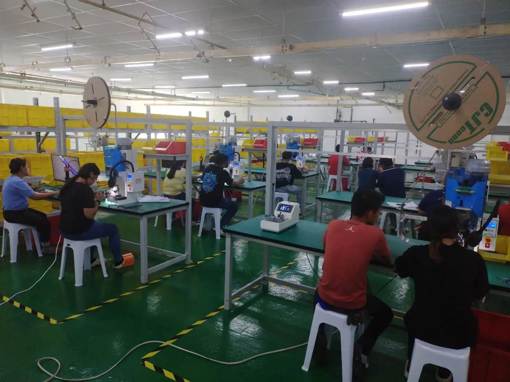 Crimping workshop in production with operators at the Cavite plant